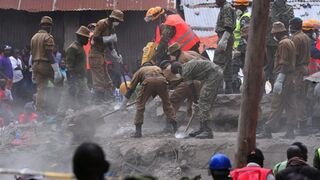 Rescue workers remove debris from the rubble of the six-story building that collapsed, killing 23 people, in Nairobi, Kenya’s suburb of Huruma on May 3, 2016.SIMON MAINA/AFP/Getty Images