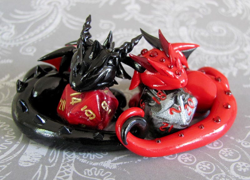 Illustration for article titled Adorable sculpted dragons guard your 20-sided dice