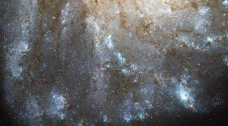Illustration for article titled There's a mysterious glow in this galaxy