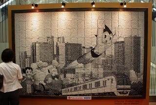 Illustration for article titled Astro Boy Mural Created From 138,000 Recycled Tokyo Metro Tickets