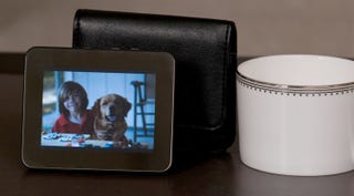 Illustration for article titled HP Portable Digital Picture Frame Lets You Take Your Pics on the Go