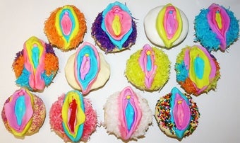 Illustration for article titled Sugar And Spice And Neon Anatomical Decorations, That's What Vagina Cupcakes Are Made Of