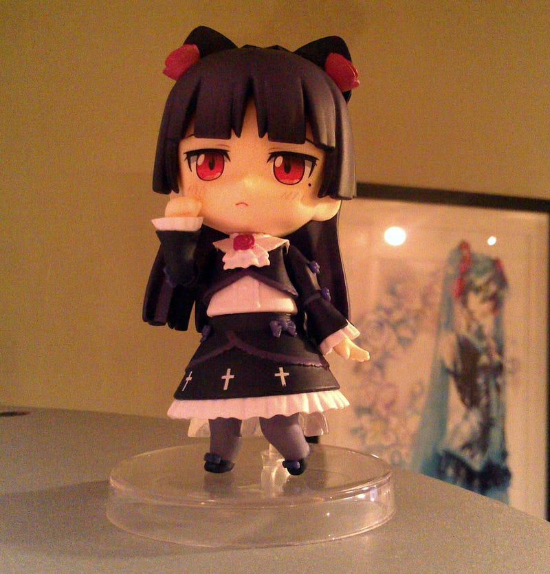 Illustration for article titled Beat a game, and figurine came in! :D
