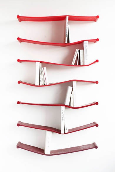 Illustration for article titled Bendy Rubber Bookshelves Literally Accommodate Whatever Literary Tastes You Have On Hand
