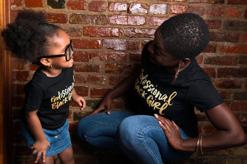 Yaba Blay, creator of Professional Black Girl, with her granddaughter, âProfessional Black Girlâ Nazahah Sanaa.Courtesy of Yaba Blay