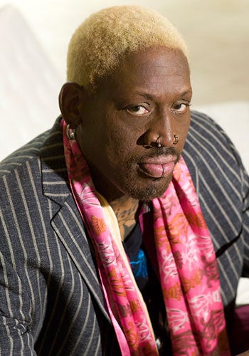 Illustration for article titled Dennis Rodman Was Getting A Beej During This Interview