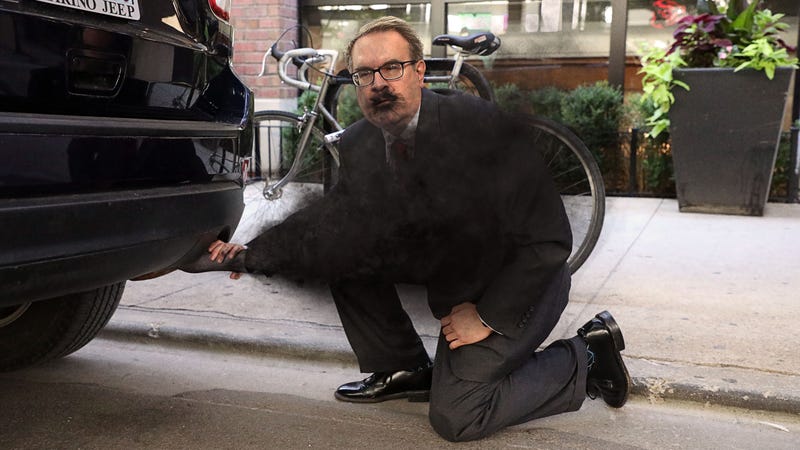 Illustration for article titled EPA Administrator Proves Carbon Emissions Not Harmful By Inhaling Directly From Truck’s Tailpipe