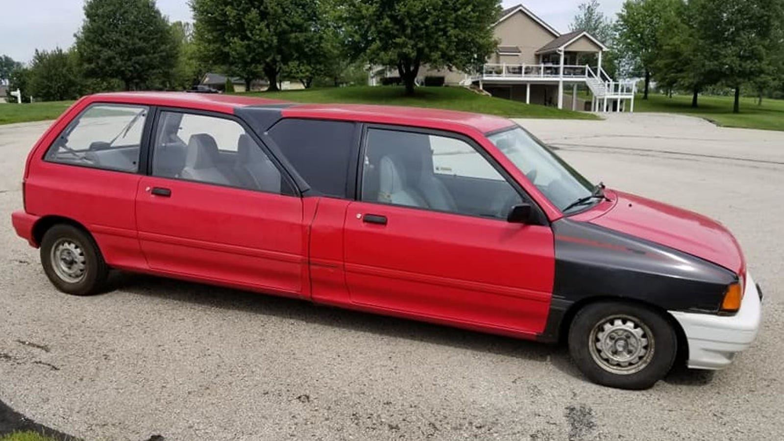 Someone Built A Limo Out Of Two Tiny Ford Festivas And I'm Both