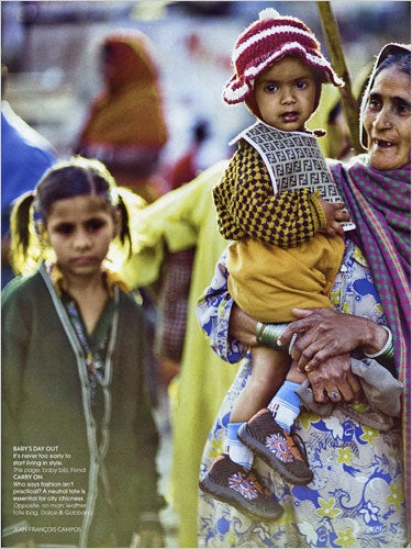 Illustration for article titled Vogue India Puts Fendi Bib On Impoverished Child; Critics Freak