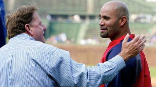 Illustration for article titled Albert Pujols Hugs Jim Hendry: A Photoplay In 10 Parts