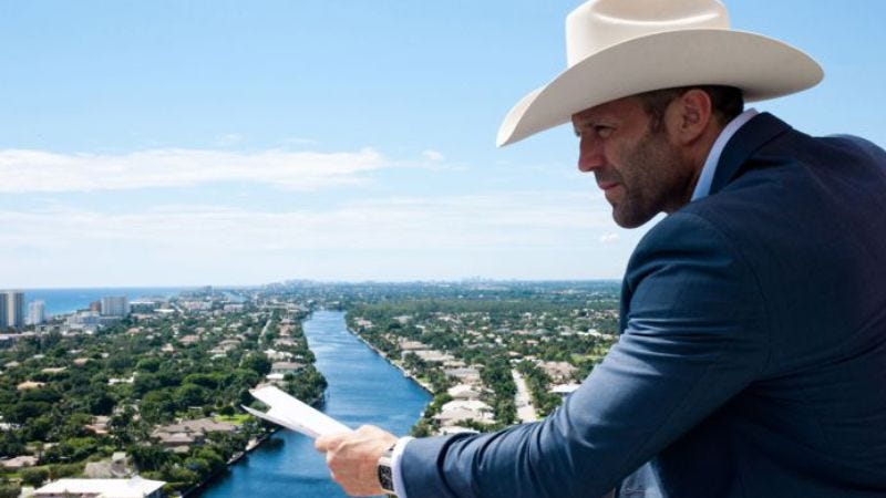 Illustration for article titled Caption Contest: What is Jason Statham thinking?