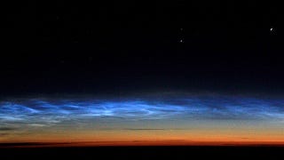 Illustration for article titled Mysterious Electric Blue Clouds Appear Again Over the Poles