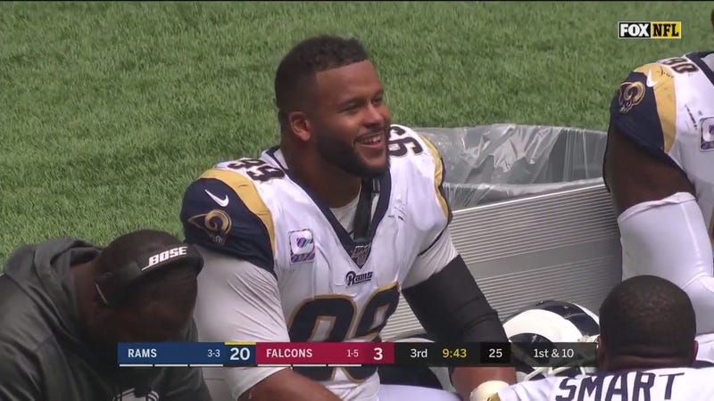Illustration for article titled Devonta Freeman Ejected For Punching Aaron Donald After Donald Hoisted Him Up Like A Child