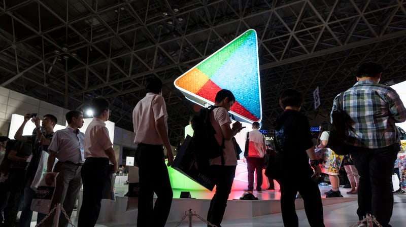 Attendees in line at the Google Play booth during the Tokyo Game Show 2018 in Chiba, Japan.