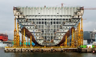 Illustration for article titled Pictures of the World's Biggest Cargo Ship Make You Feel Tiny