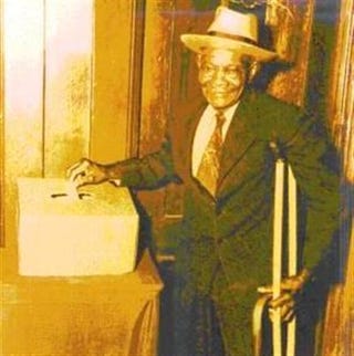 Fred Grigsby, great-grandfather of Pat Bates (pictured below) casting his vote decades ago.