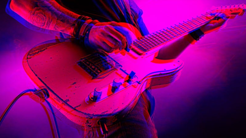 Photo: Total Guitar Magazine/Contributor/Getty Images. Graphic: Nicole Antonuccio
