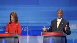 GOP presidential debate: Michele Bachmann and Herman Cain  (Getty) 
