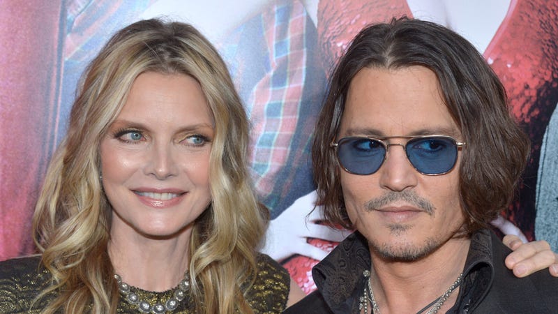 Illustration for article titled Johnny Depp and Michelle Pfeiffer Have Perfected the Art of the Side-Eye