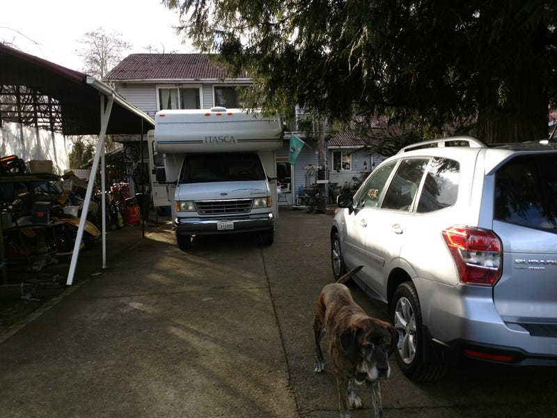 Front view- had to move all the cars around and dismantle the gate just to pull it in.