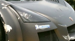 Illustration for article titled Formula 1 driver Sutil gives a Gumpert some Nürburgring wall rash