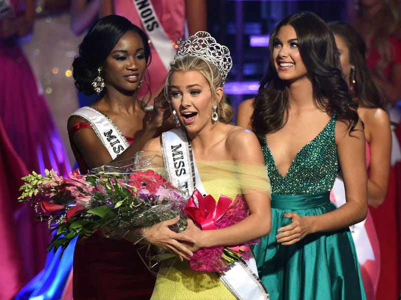Miss Texas Teen USA 2016 Karlie Hay (center) reacts as Miss USA 2016 Deshauna Barber (left) and Miss Teen USA 2015 Katherine Haik (right) crown Hay as Miss Teen USA 2016 during the Miss Teen USA competition in Las Vegas on July 30, 2016. Ethan Miller/Getty Images
