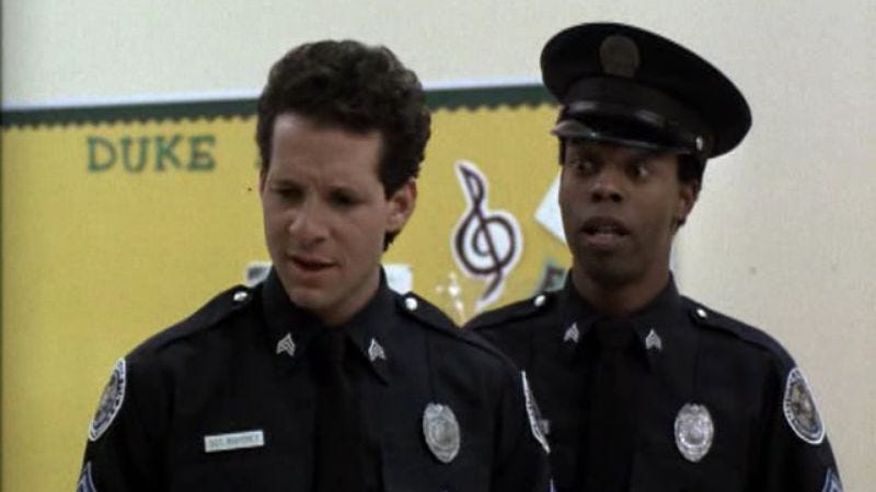 Illustration for article titled The Police Academy cast’s next assignment is fighting giant, fire-breathing spiders