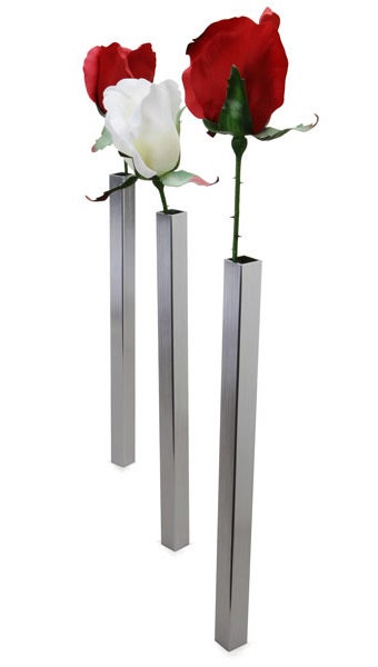 Illustration for article titled Super Skinny Vase Balances With MAGIC (...or Magnetism)