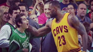 LeBron James shares a special moment with 16-year-old Aaron Miller at TD Garden in Boston Dec. 15, 2015.CBS screenshot