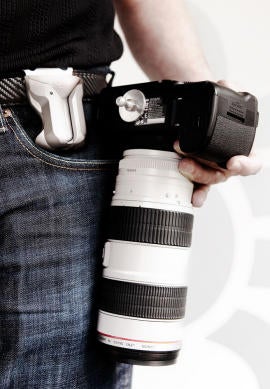 Illustration for article titled Spider Belt Holster Lugs DSLRs, Dad Style