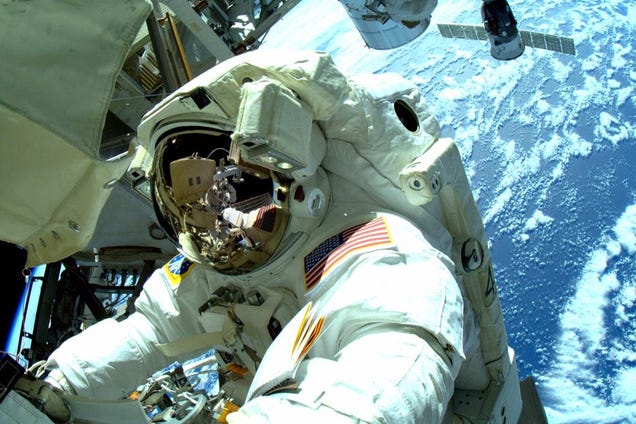 fragile humans spacewalk to upgrade space station communications