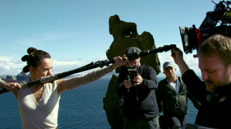 Director Rian Johnson (right) directs a scene from Star Wars: The Last Jedi.