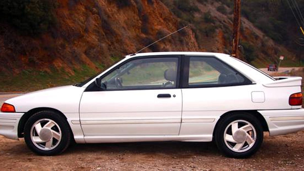 For 3000 this 1991 ford escort gt says take me out