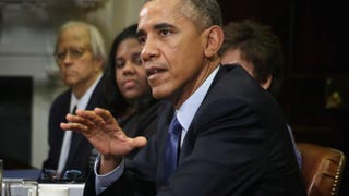 President Barack Obama discusses the benefits of the Affordable Care Act during a meeting Feb. 3, 2015, in the Roosevelt Room of the White House with citizens who wrote him about the health care law. Alex Wong/Getty Images
