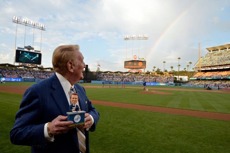 Illustration for article titled Of Course There Was An Awesome Rainbow On Vin Scully's Bobblehead Night