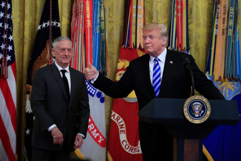 President Donald Trump with Defense Secretary Jim Mattis gestures during a reception commemorating the 35th anniversary of the attack on Beirut Barracks in the East Room at the White House in Washington, Thursday, Oct. 25, 2018.
