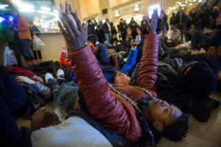 Demonstrators stage a die-in in Grand Central Terminal in New York City Dec. 6, 2014, protesting the Staten Island, N.Y., grand jury's decision not to indict a police officer involved in the choke hold death of Eric Garner in July.Andrew Burton/Getty Images