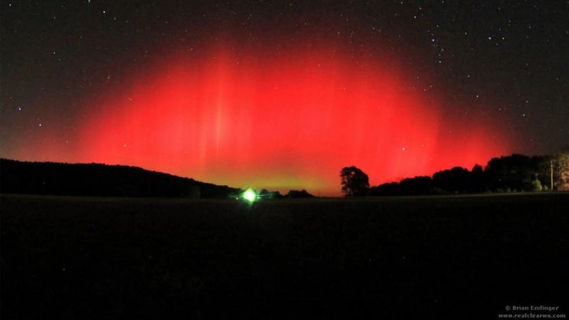 A rare view of the aurora borealis, shot from a field in ...