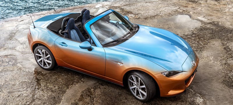 Illustration for article titled Placate Your Fears Of Global Economic Collapse With This Two-Tone Miata With A Denim Interior