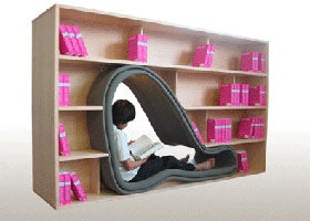 Illustration for article titled Cave Bookcase Saves Space For Those Who Don't Need It