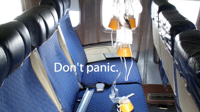 Image result for image of oxygen masks drop inside plane by passengers