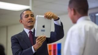 President Barack Obama uses an Apple iPad to record a seventh grader as he tours a classroom that uses technology to enhance students' learning experience, at Buck Lodge Middle School, Feb. 4, 2014, in Adelphi, Md.Jim Lo Scalzo-Pool/Getty Images