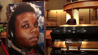 The casket of Michael Brown sits inside Friendly Temple Missionary Baptist Church awaiting the start of his funeral Aug. 25, 2014, in St. Louis. Brown, an 18-year-old unarmed teenager, was shot and killed by Police Officer Darren Wilson in the nearby town of Ferguson, Mo., on Aug. 9, 2014.Robert Cohen-Pool/Getty Images