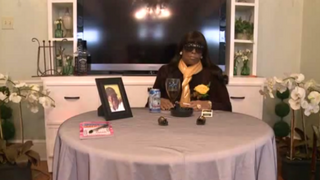 Miriam Burbank at her own funeral in New OrleansScreenshot/MagnifyÂ