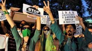 Iranian students protest in support of opposition leader Mir Hossein Mousavi.