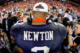 2010 Heisman Trophy winner Cam Newton will enter NFL draft.