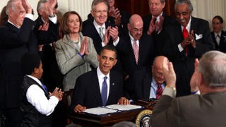 President Barack Obama is applauded after signing the Affordable Care Act on March 23, 2010, in the East Room of the White House.Win McNamee/Getty Images