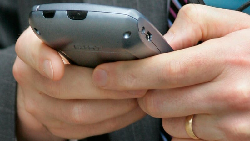 Illustration for article titled Tech-Obsessed Jerks Care More About Their Dumb Phones Than Their Wedding Rings