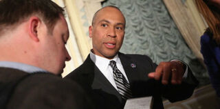 Massachusetts Gov. Deval Patrick speaks at a news conference in Boston. (Mario Tama/Getty Images)