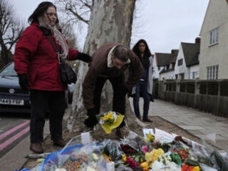 Flowers at the Stephen Lawrence memorial in London (Carl Court/Getty Images)